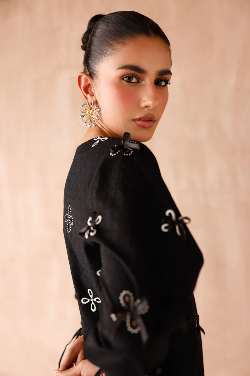 Model wearing black embroidered coords EP-07 Kaif from Qalamkar, a chic Pakistani luxury pret available online in UK.
