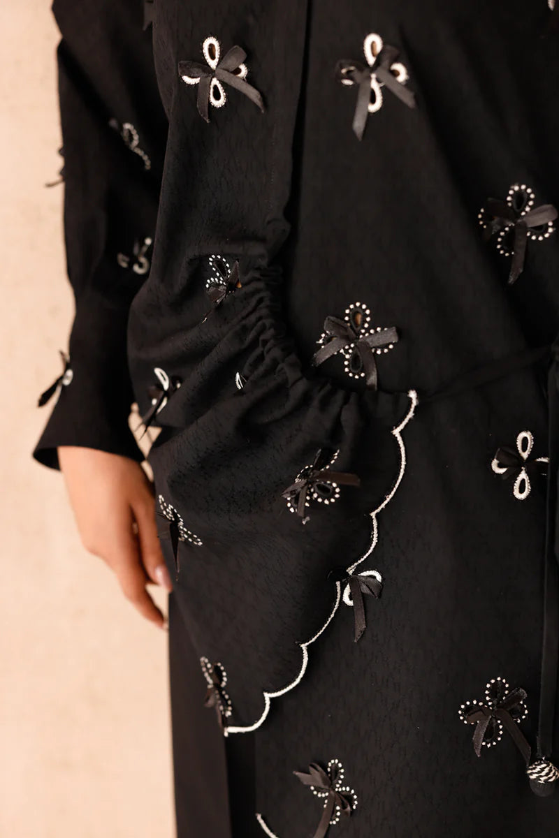 Model wearing black embroidered coords EP-07 Kaif from Qalamkar, a chic Pakistani luxury pret available online in UK.