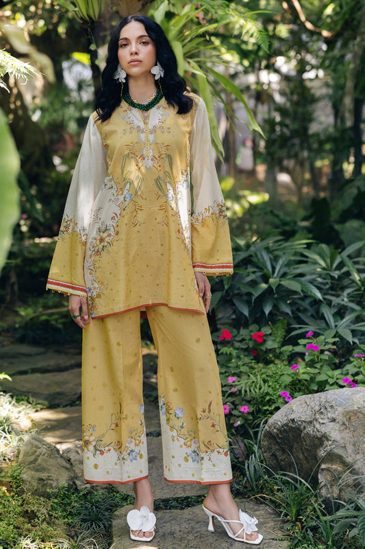 Model wearing OP-04 Tena, front view, a Pakistani designer outfit by Qalamkar, available online in the UK.