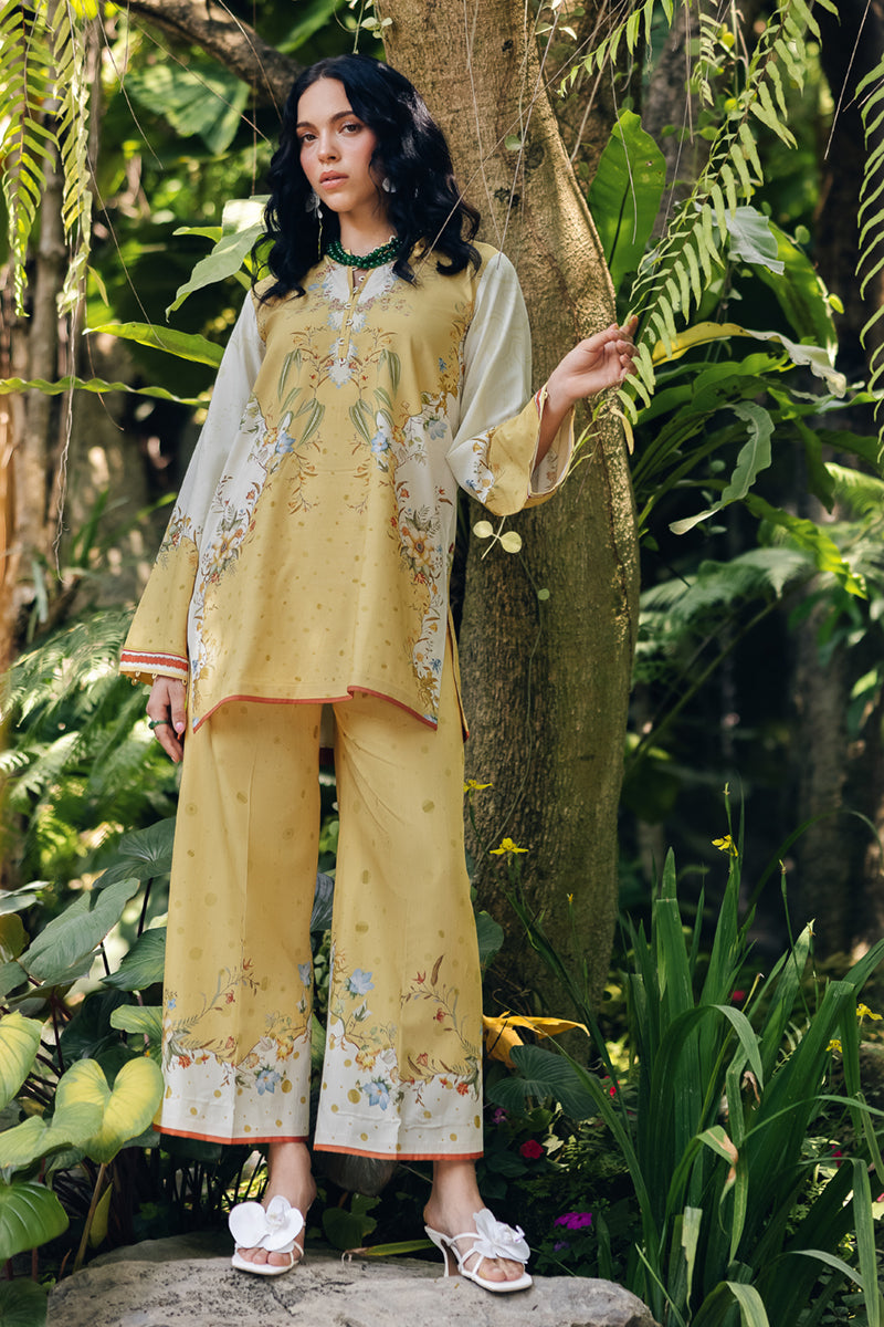Model wearing OP-04 Tena, back view, a Pakistani designer outfit by Qalamkar, available online in the UK.