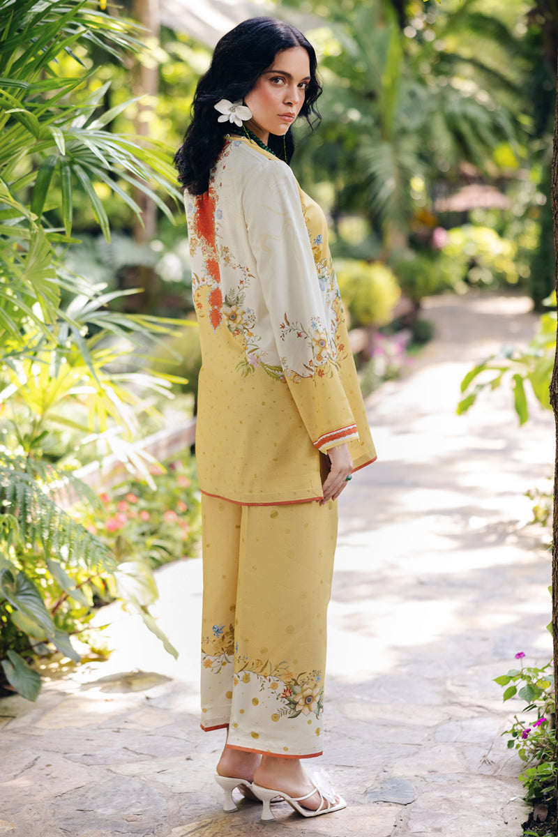 Model wearing OP-04 Tena, embroidery focus, a Pakistani designer outfit by Qalamkar, available online in the UK.