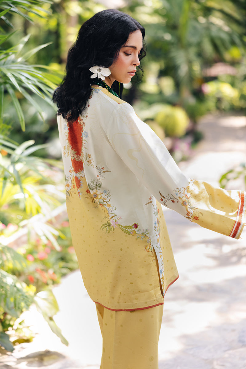 Model wearing OP-04 Tena, sleeves close-up, a Pakistani designer outfit by Qalamkar, available online in the UK.