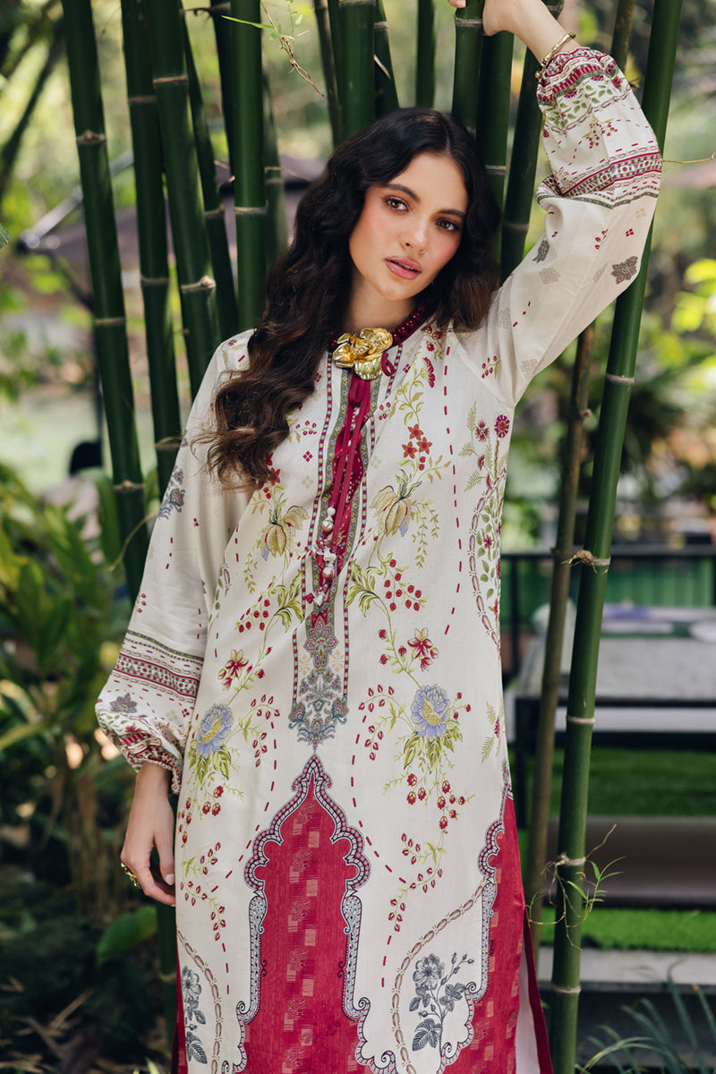Model wearing OP-01 Lapo, three-quarter view, a Pakistani designer outfit by Qalamkar, available online in the UK.