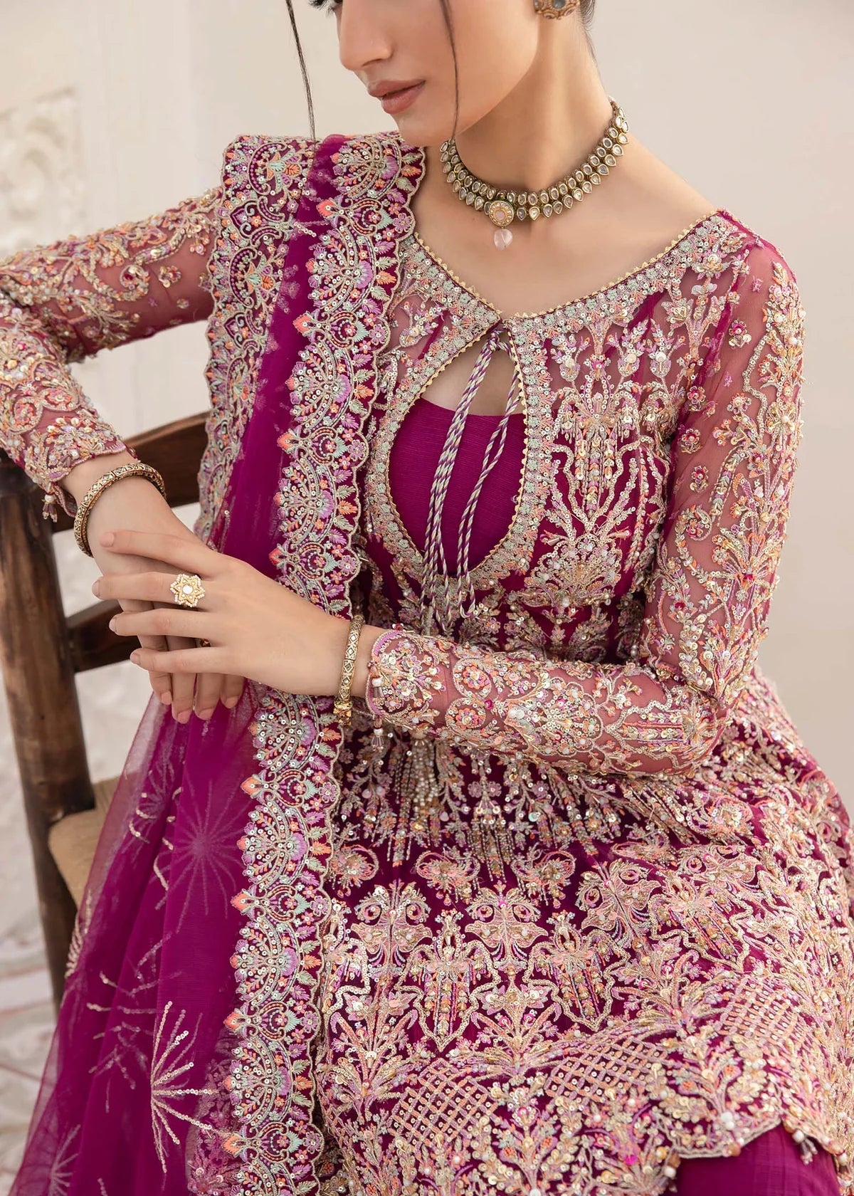 Model wearing deep magenta Kaira dress by Kanwal Malik, adorned with rich embroidery—Pakistani luxury pret available online in UK.