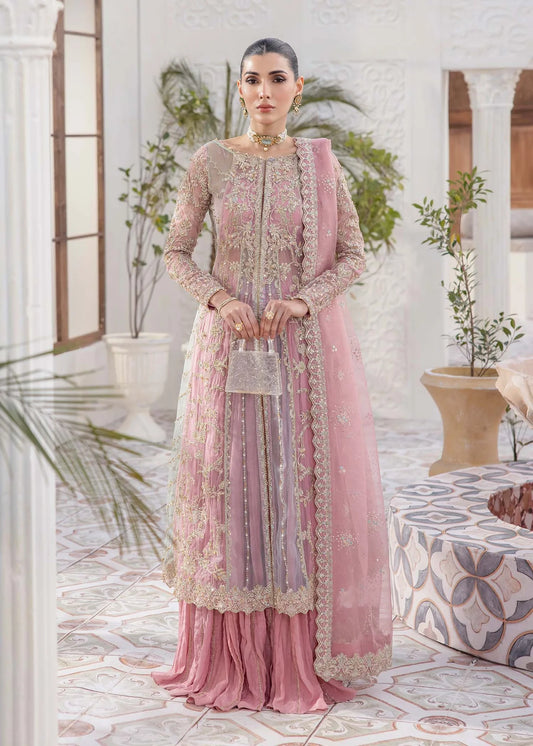 Model wearing pastel pink Sanya dress by Kanwal Malik, Pakistani luxury pret available online in UK for weddings and festive wear.