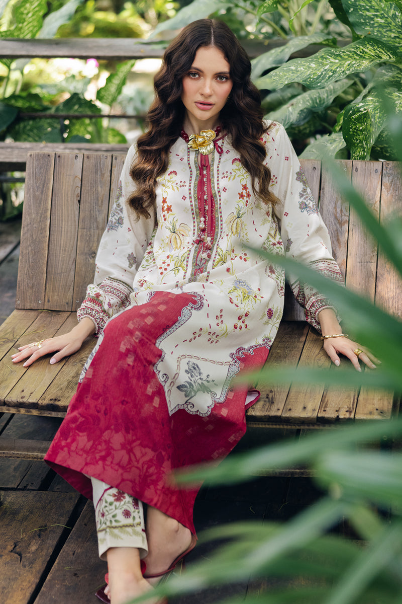 Model wearing OP-01 Lapo, hemline detail, a Pakistani designer outfit by Qalamkar, available online in the UK.