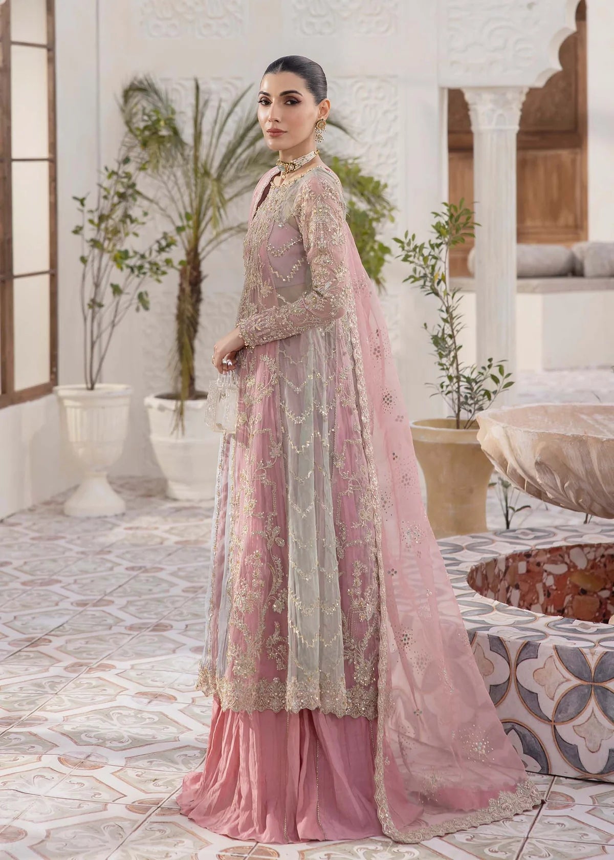 Model wearing pastel pink Sanya dress by Kanwal Malik, Pakistani luxury pret available online in UK for weddings and festive wear.