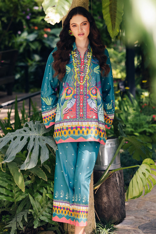 Model wearing OP-10 Liva, front view, a Pakistani designer outfit by Qalamkar, available online in the UK.