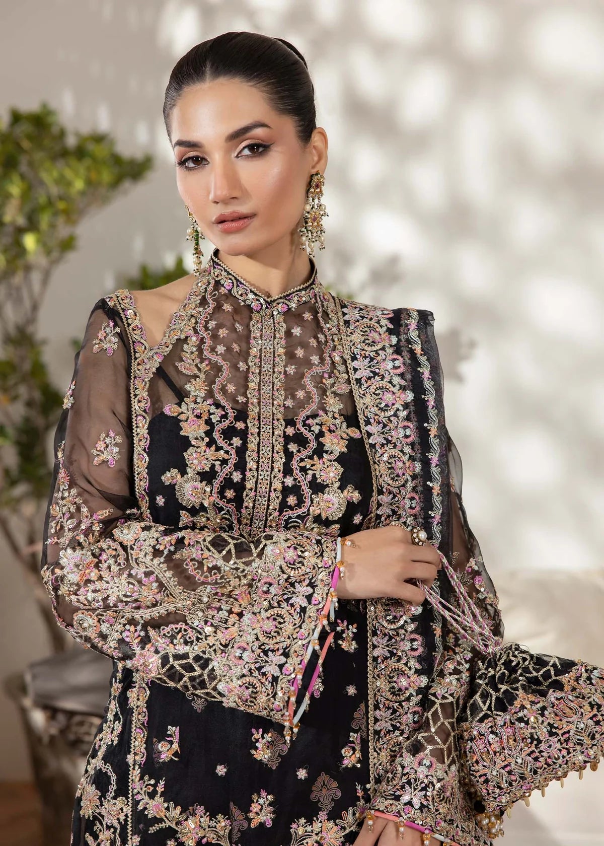 Model wearing black Rama outfit from Kanwal Malik with intricate embroidery—Pakistani luxury pret available online in UK.