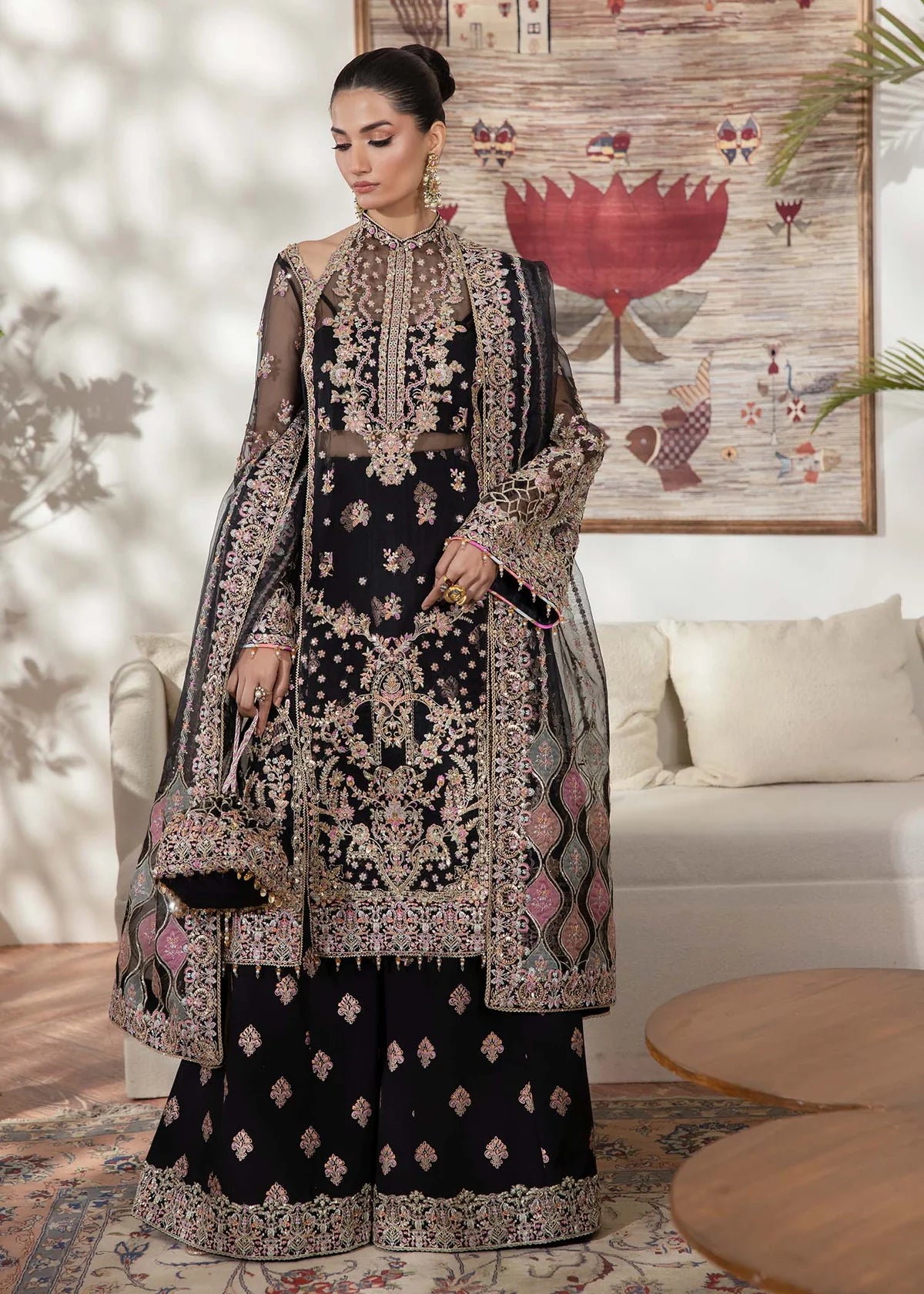 Model wearing black Rama outfit from Kanwal Malik with intricate embroidery—Pakistani luxury pret available online in UK.