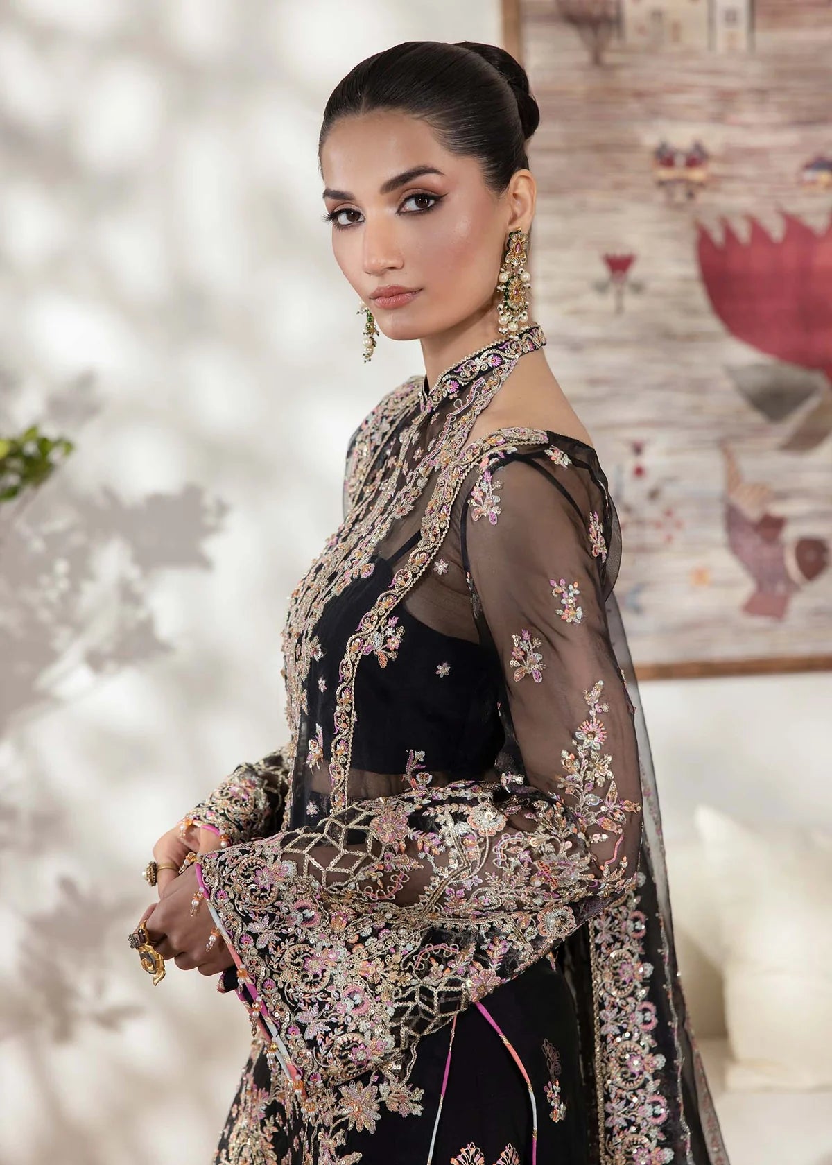 Model wearing black Rama outfit from Kanwal Malik with intricate embroidery—Pakistani luxury pret available online in UK.