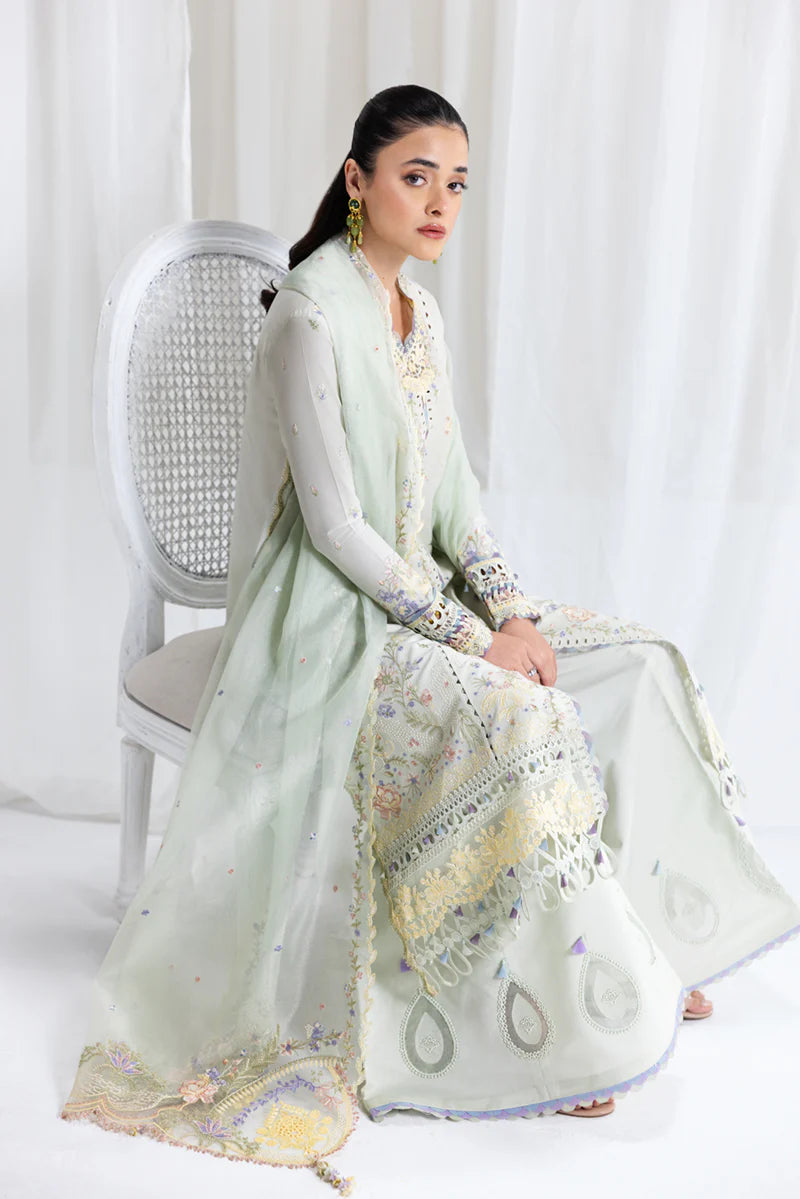 Model wearing pastel mint green SB-08 Rimsha from Qalamkar Eid Edit '25, intricate embroidery, Pakistani Luxury pret, Pakistani clothes online in UK.
