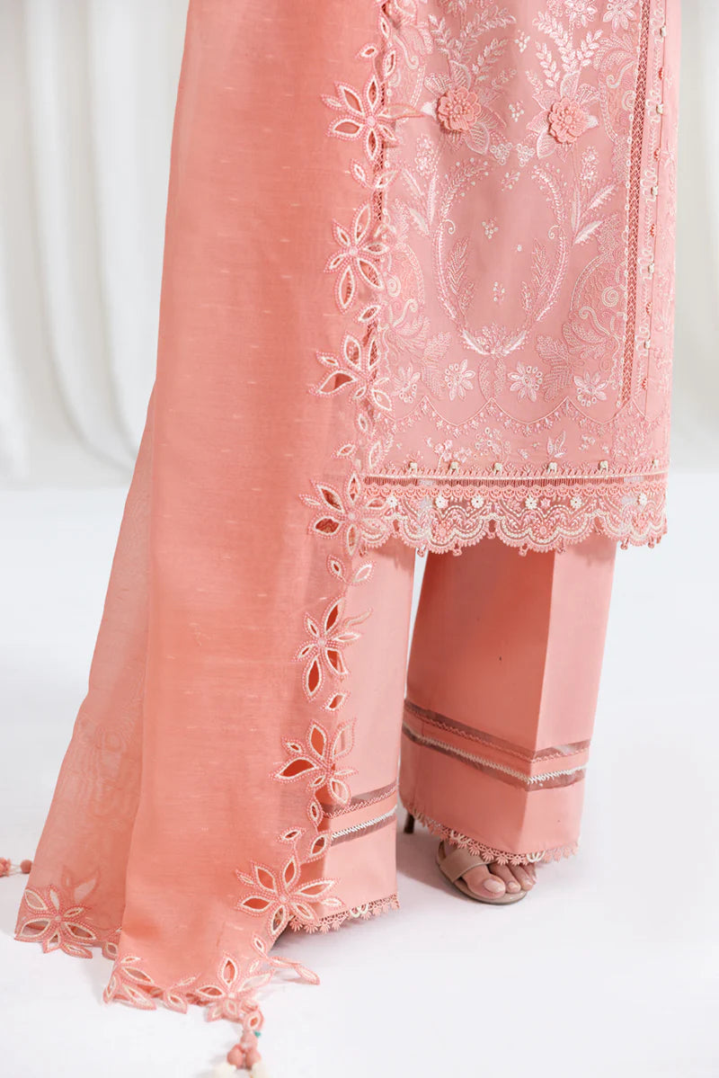Model wearing peach Qalamkar SB-12 Jafa suit with delicate embroidery, perfect for Pakistani luxury pret and Eid outfits online in UK.