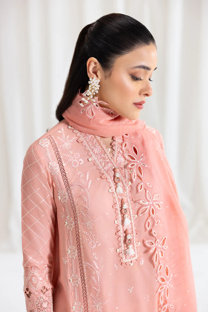 Model wearing peach Qalamkar SB-12 Jafa suit with delicate embroidery, perfect for Pakistani luxury pret and Eid outfits online in UK.