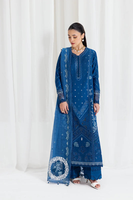 Model wearing deep teal blue Qalamkar SB-11 Noray embroidered outfit, perfect for Eid and Pakistani luxury pret clothes online in UK.