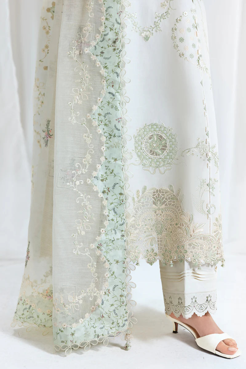 Model wearing pistachio green Qalamkar SB-10 Nadia embroidered outfit, perfect for Eid and Pakistani luxury pret clothes online in UK.