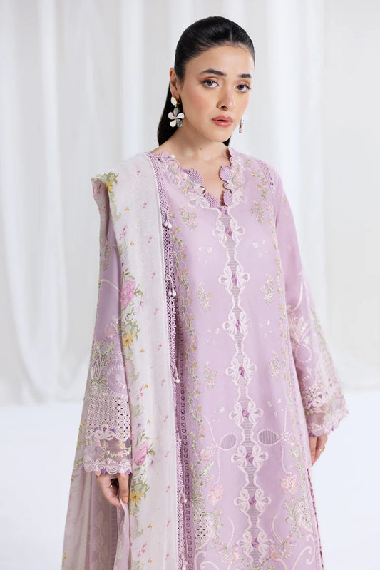 Model wearing lilac Qalamkar SB-06 Komal suit with pastel embroidery, ideal for Eid celebrations and Pakistani luxury pret online in UK.