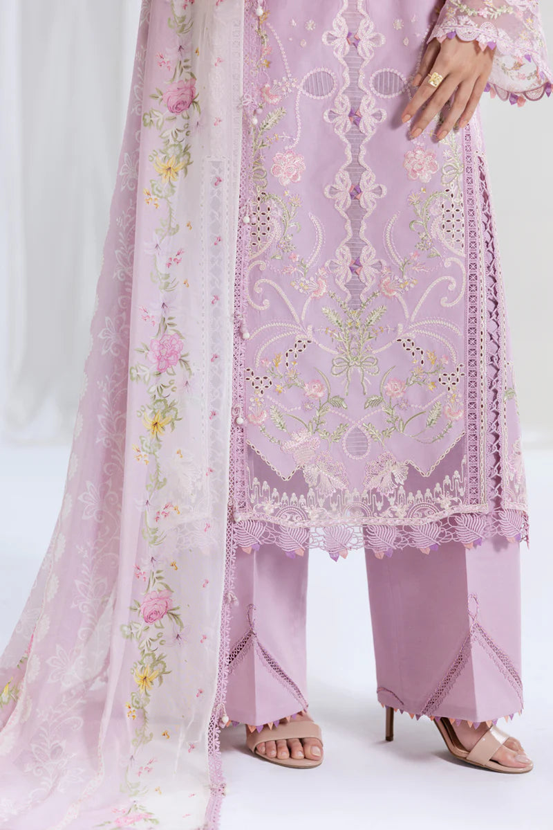 Model wearing lilac Qalamkar SB-06 Komal suit with pastel embroidery, ideal for Eid celebrations and Pakistani luxury pret online in UK.