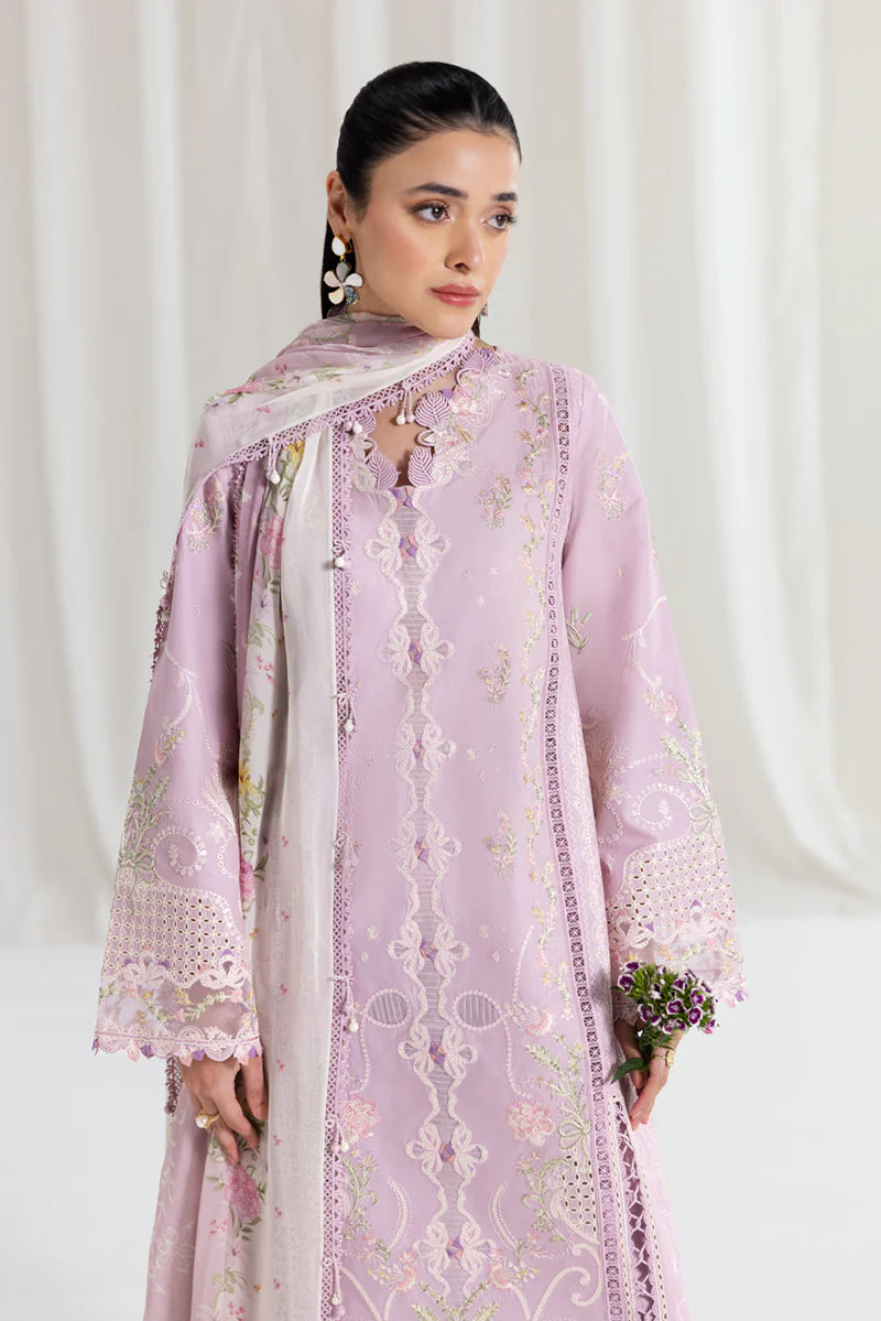 Model wearing lilac Qalamkar SB-06 Komal suit with pastel embroidery, ideal for Eid celebrations and Pakistani luxury pret online in UK.