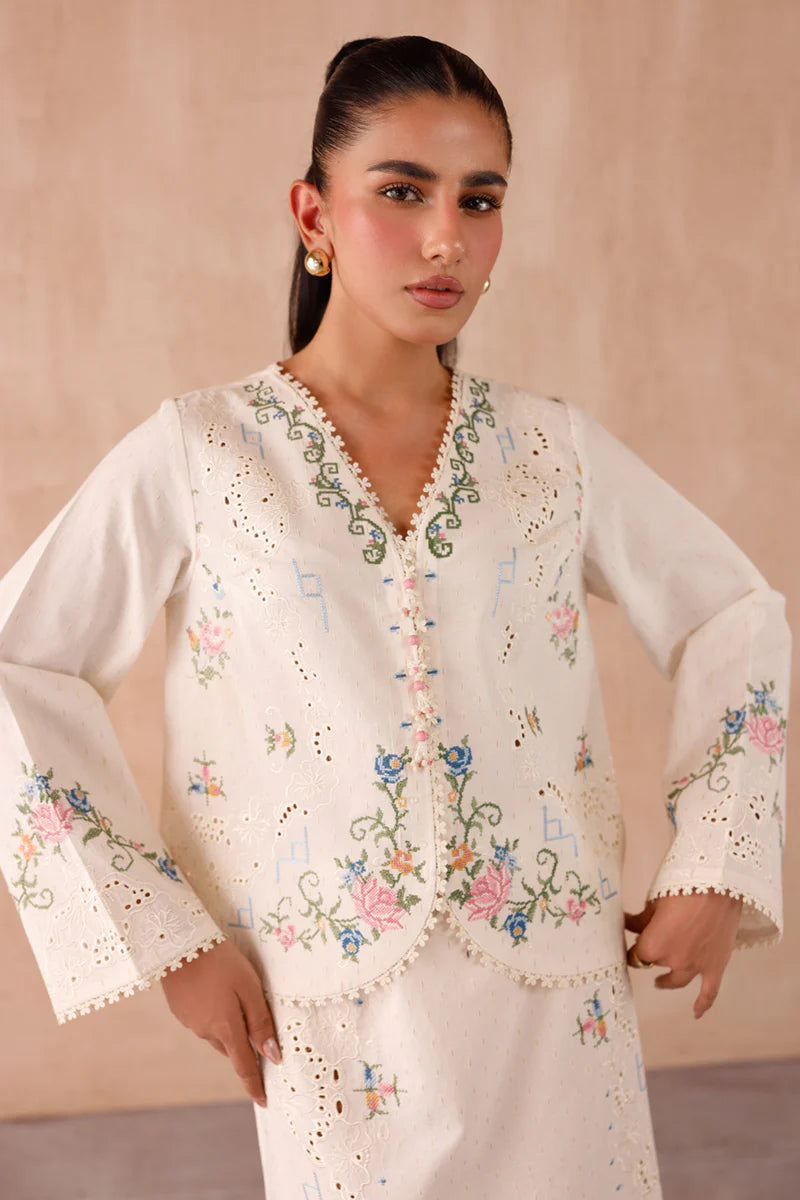 Model wearing cream embroidered coord set EP-02 Zena from Qalamkar, perfect for Pakistani luxury pret and Pakistani clothes online in UK.