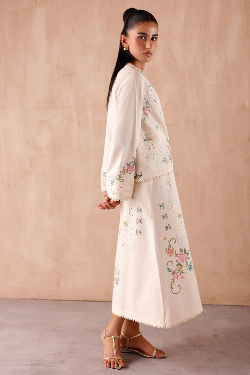 Model wearing cream embroidered coord set EP-02 Zena from Qalamkar, perfect for Pakistani luxury pret and Pakistani clothes online in UK.