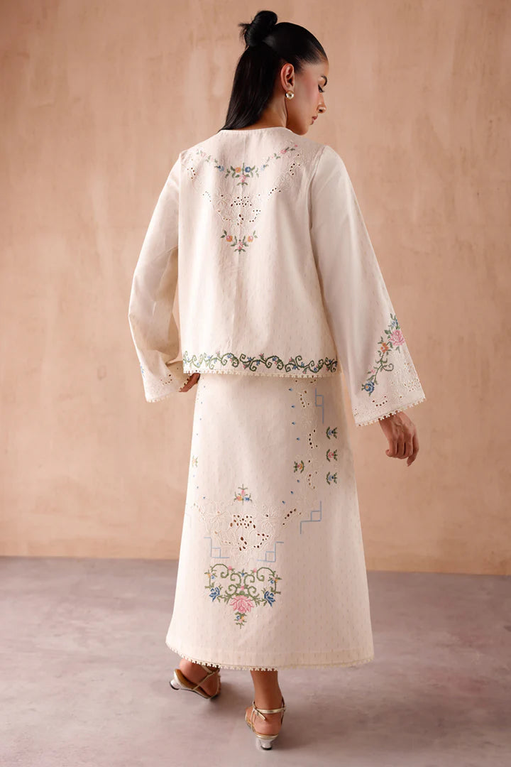 Model wearing cream embroidered coord set EP-02 Zena from Qalamkar, perfect for Pakistani luxury pret and Pakistani clothes online in UK.