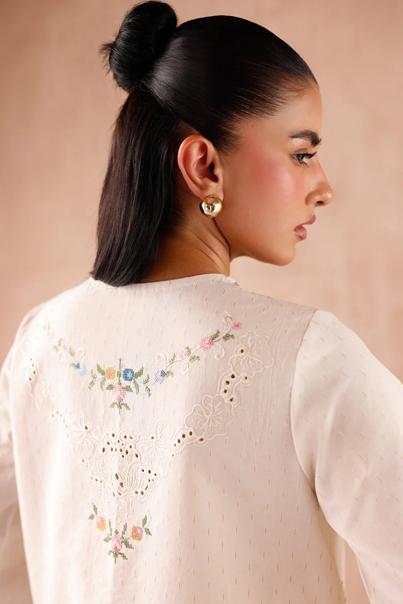 Model wearing cream embroidered coord set EP-02 Zena from Qalamkar, perfect for Pakistani luxury pret and Pakistani clothes online in UK.