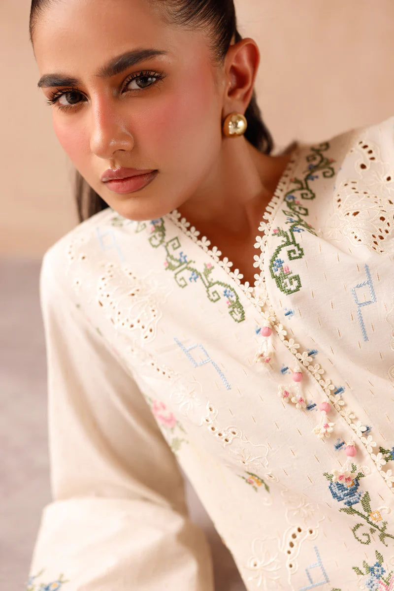 Model wearing cream embroidered coord set EP-02 Zena from Qalamkar, perfect for Pakistani luxury pret and Pakistani clothes online in UK.