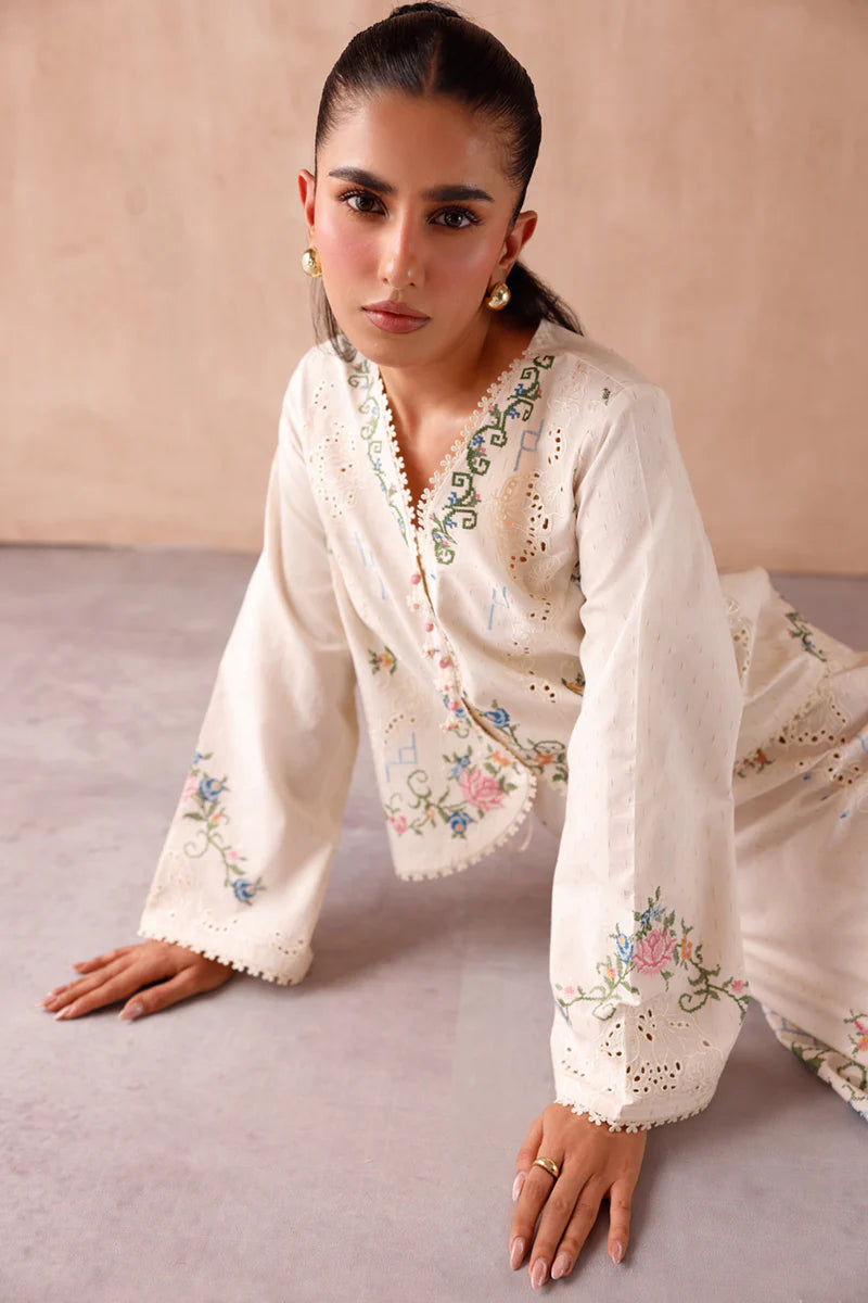 Model wearing cream embroidered coord set EP-02 Zena from Qalamkar, perfect for Pakistani luxury pret and Pakistani clothes online in UK.