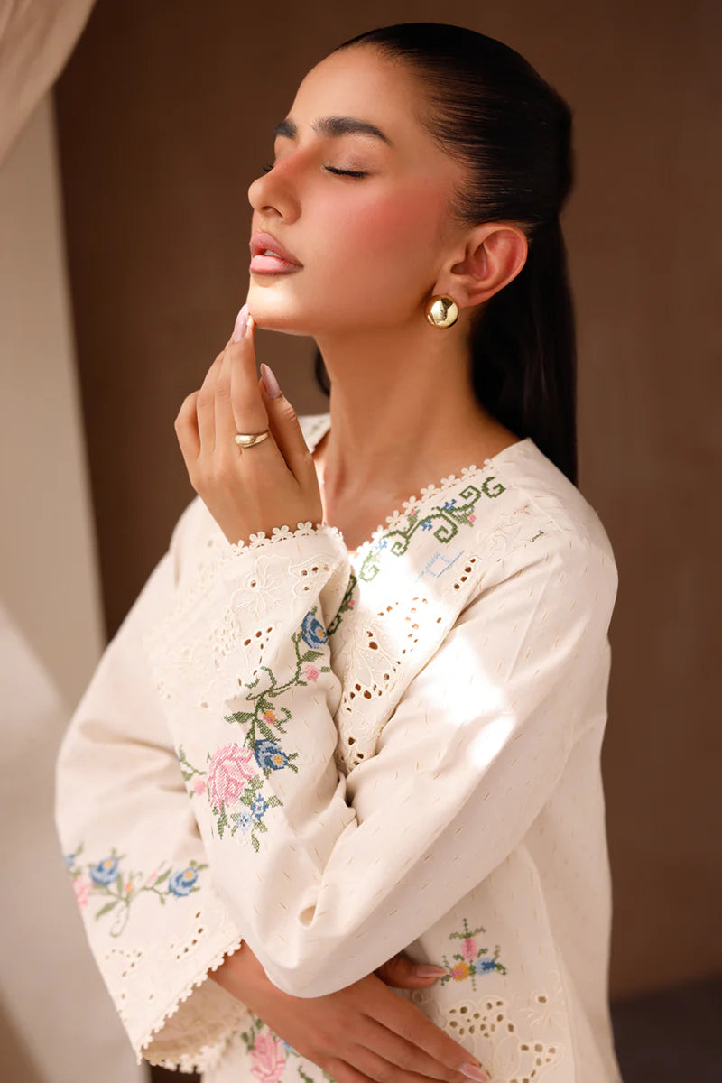 Model wearing cream embroidered coord set EP-02 Zena from Qalamkar, perfect for Pakistani luxury pret and Pakistani clothes online in UK.