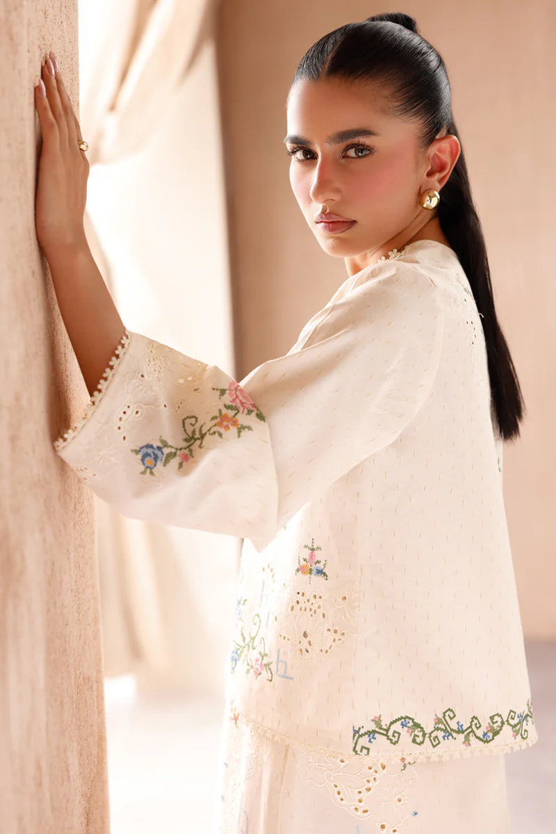 Model wearing cream embroidered coord set EP-02 Zena from Qalamkar, perfect for Pakistani luxury pret and Pakistani clothes online in UK.
