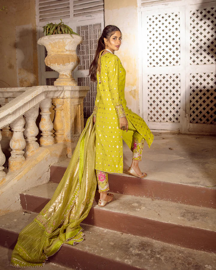 model wearing lime green dress by Faiza Saqlain, Pakistani luxury pret available online in UK for festive celebrations