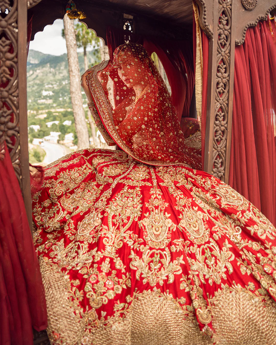 model wearing red dress by Faiza Saqlain, Pakistani luxury pret ideal for online shopping in the UK