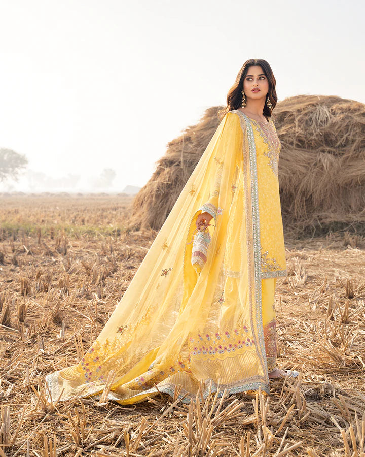 model wearing yellow dress by Faiza Saqlain, Pakistani luxury pret ideal for online shopping in the UK