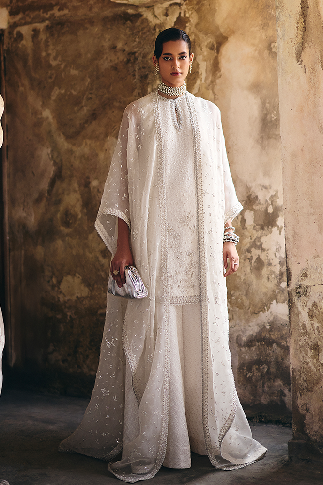 Model wearing ELUNA, model styling view, a Pakistani designer outfit by Suffuse, available online in the UK.