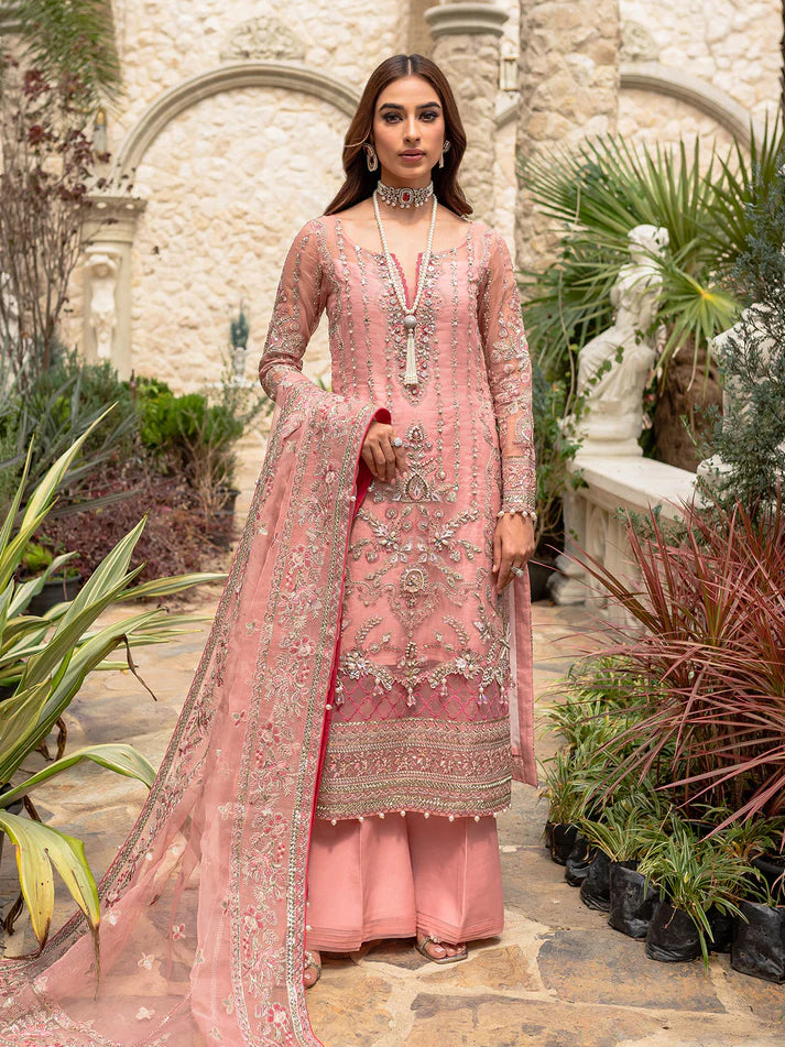Model wearing soft pink Aethira GL-LP-V1-01 from Gulaal, featuring detailed embellishments—Pakistani luxury pret clothes online in UK.