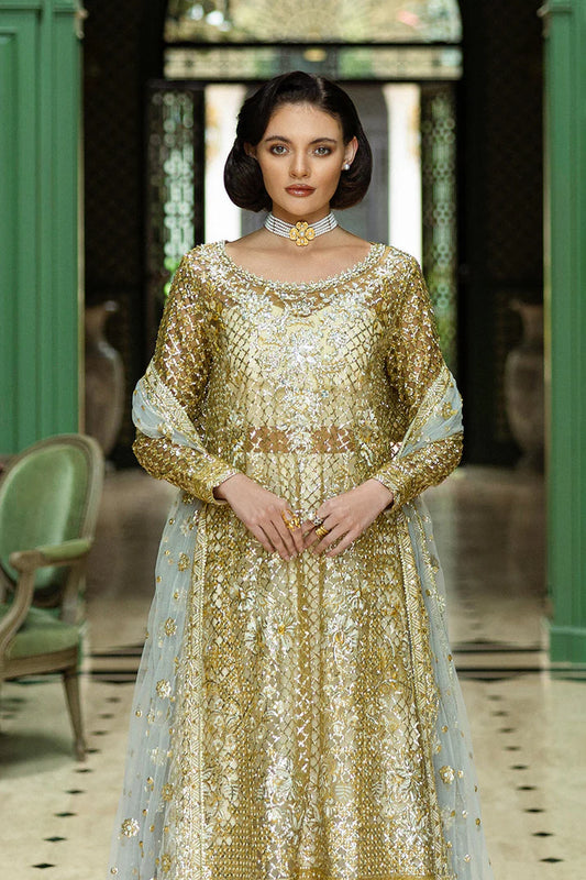 Model wearing gold and silver embellished dress from Mushq Only You, Pakistani luxury pret ideal for weddings, shop online in UK
