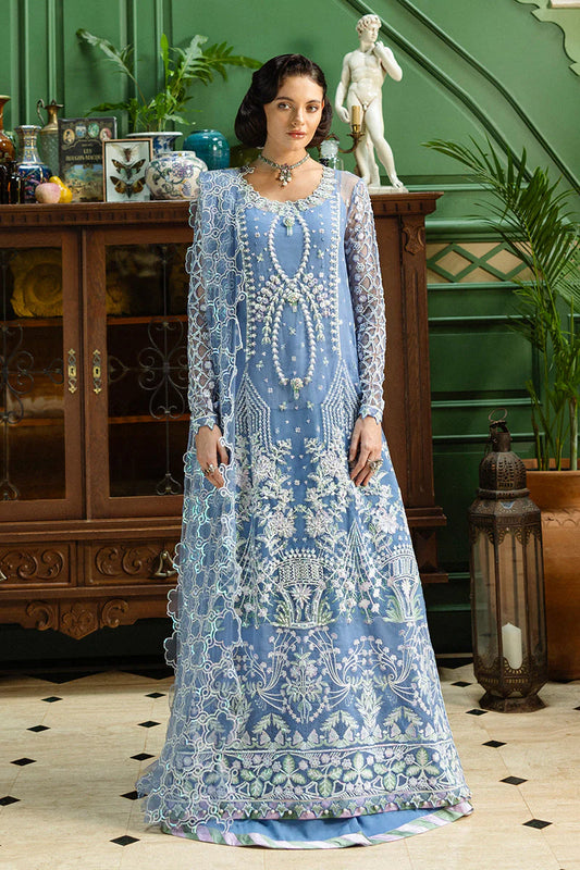 Model wearing powder blue embroidered dress from Mushq Before the Rain, Pakistani luxury pret, shop Pakistani clothes online in UK
