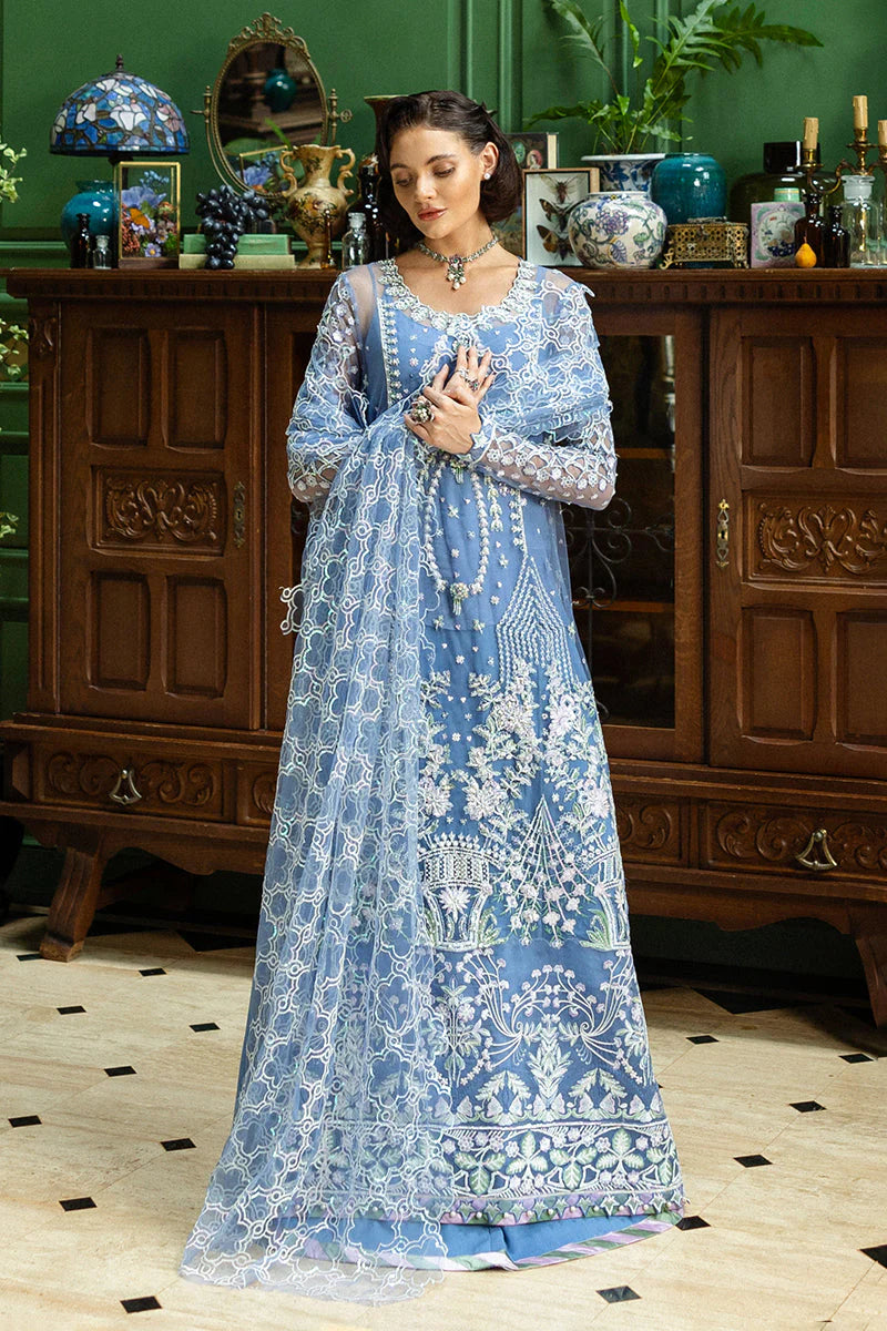 Model wearing powder blue embroidered dress from Mushq Before the Rain, Pakistani luxury pret, shop Pakistani clothes online in UK
