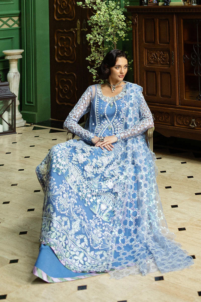 Model wearing powder blue embroidered dress from Mushq Before the Rain, Pakistani luxury pret, shop Pakistani clothes online in UK
