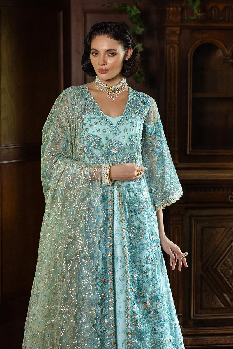 Model wearing aqua blue embellished dress from Mushq Endless Love, Pakistani luxury pret ideal for weddings, shop online in UK
