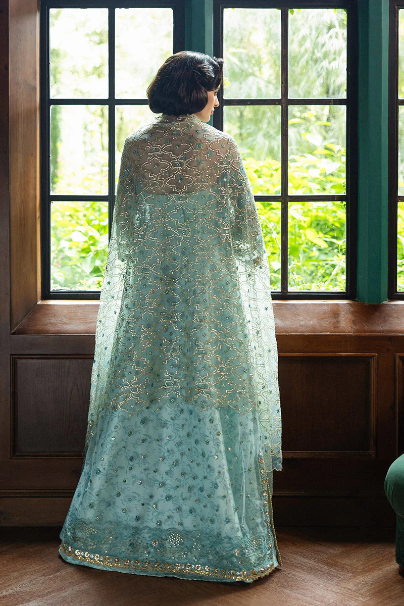 Model wearing aqua blue embellished dress from Mushq Endless Love, Pakistani luxury pret ideal for weddings, shop online in UK
