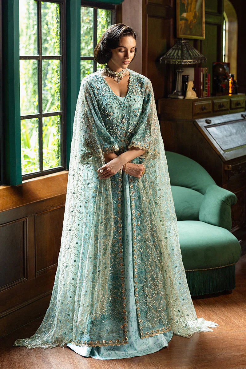 Model wearing aqua blue embellished dress from Mushq Endless Love, Pakistani luxury pret ideal for weddings, shop online in UK
