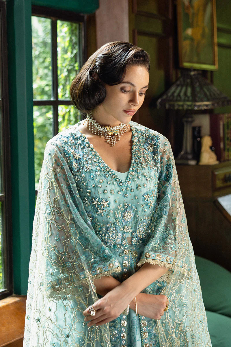 Model wearing aqua blue embellished dress from Mushq Endless Love, Pakistani luxury pret ideal for weddings, shop online in UK
