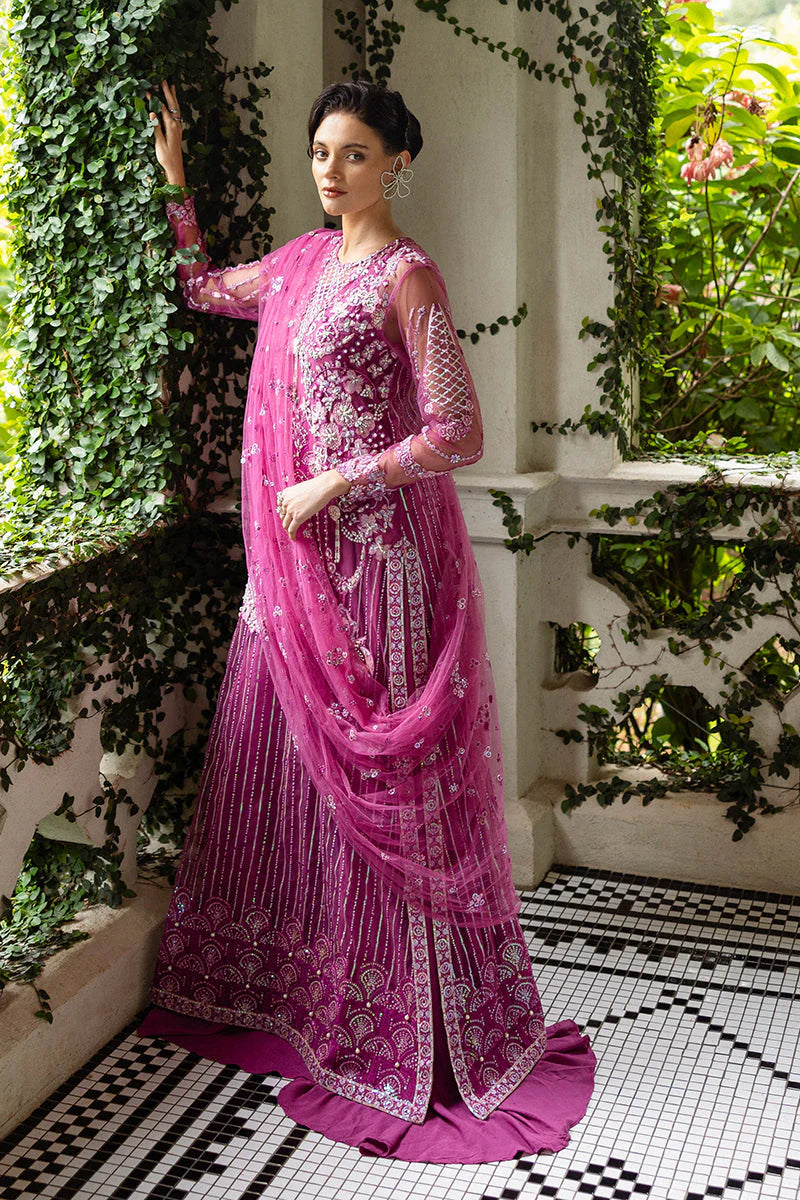 Model wearing deep pink embellished dress from Mushq Sweet November, Pakistani luxury pret for festive events, shop online in UK
