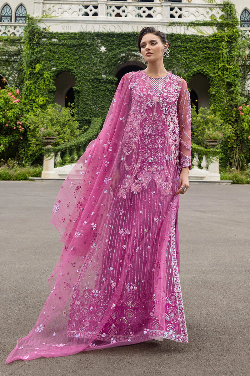 Model wearing deep pink embellished dress from Mushq Sweet November, Pakistani luxury pret for festive events, shop online in UK
