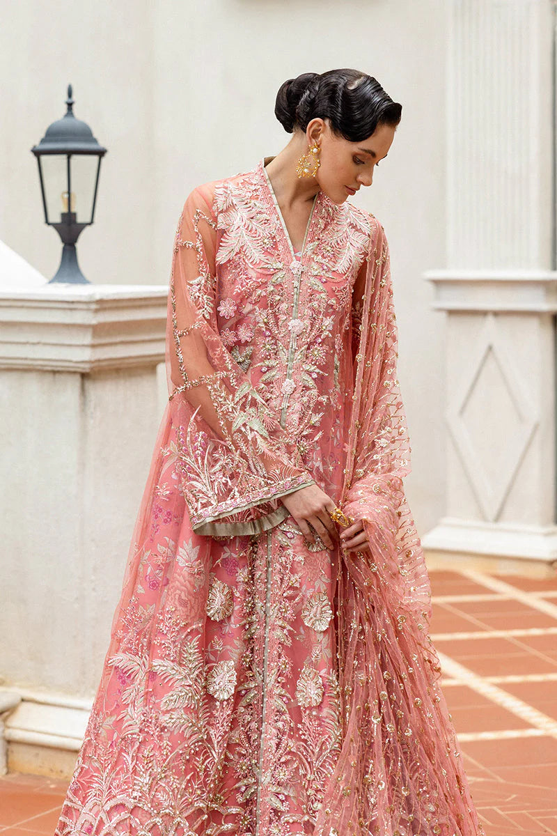 Model wearing peach embroidered dress from Mushq Wings of Desire, Pakistani luxury pret, shop authentic Pakistani clothes online in UK
