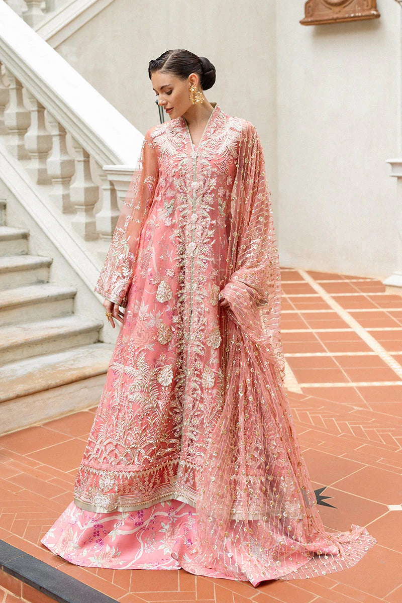Model wearing peach embroidered dress from Mushq Wings of Desire, Pakistani luxury pret, shop authentic Pakistani clothes online in UK
