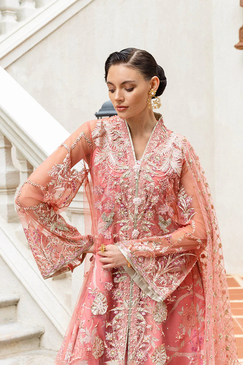 Model wearing peach embroidered dress from Mushq Wings of Desire, Pakistani luxury pret, shop authentic Pakistani clothes online in UK
