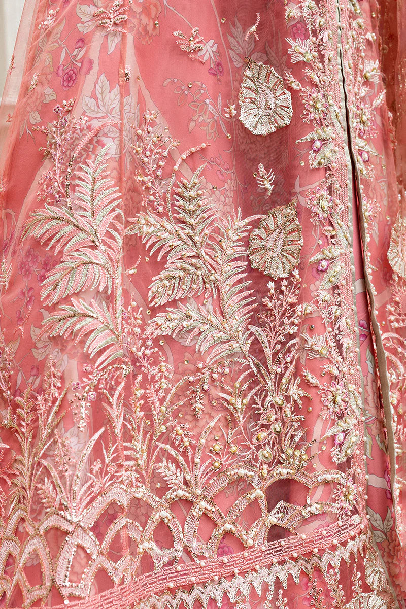 Model wearing peach embroidered dress from Mushq Wings of Desire, Pakistani luxury pret, shop authentic Pakistani clothes online in UK
